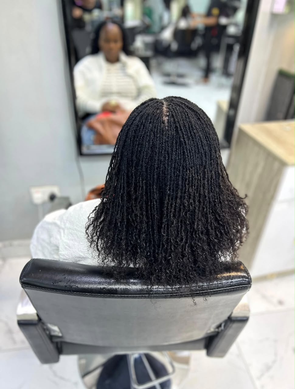 Permanent sisterlocks with human hair extensions